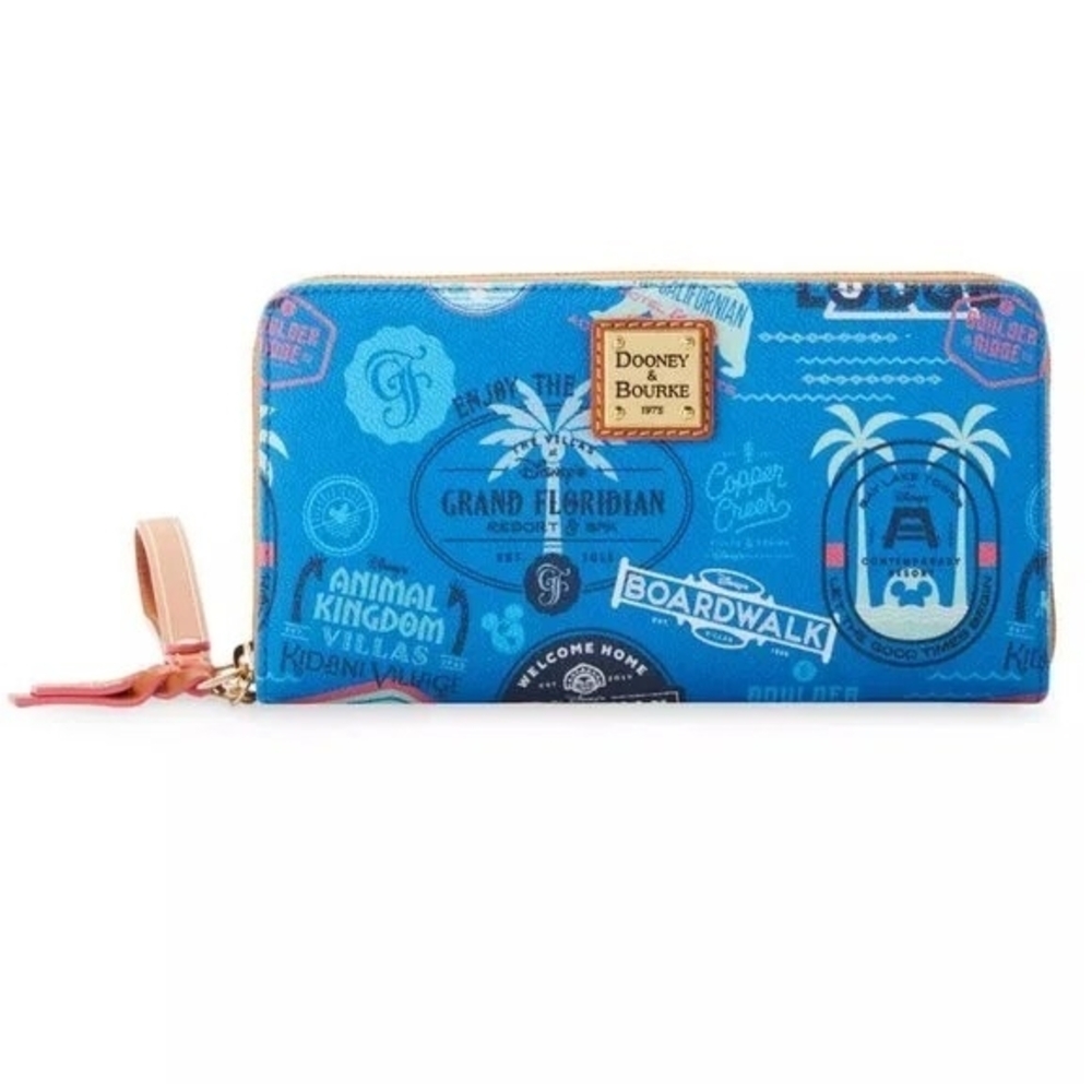 Dooney & Bourke Disney Vacation Club Resorts zip-around wristlet wallet featurin